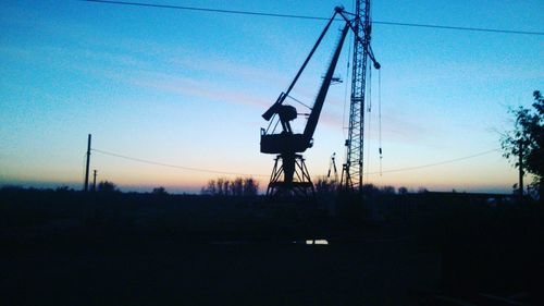 Scenic view of silhouette trees against sky