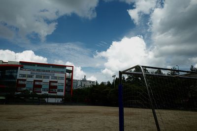 Low angle view of soccer field against sky