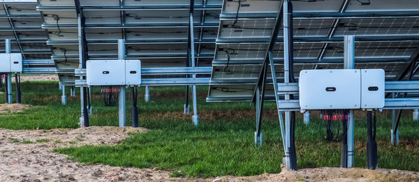 Row of machine part on field