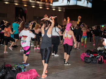 Group of people dancing at concert