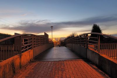 View of bridge in city against sky