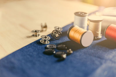 High angle view of various buttons on table