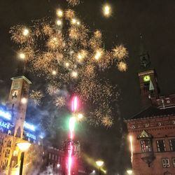 Firework display at night