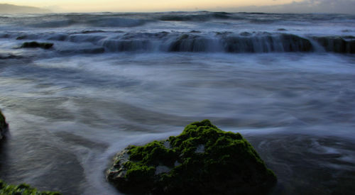 Waves splashing on rocks