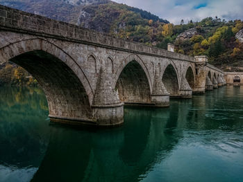 Arch bridge over river