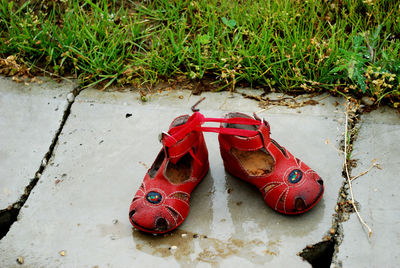 High angle view of shoes on grass