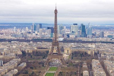 Aerial view of eiffel tower in city against sky