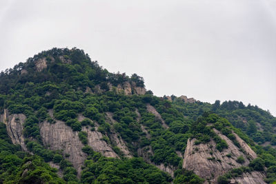 Low angle view of mountain against clear sky