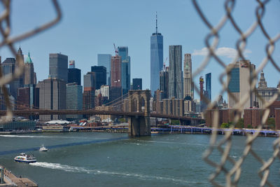 Modern buildings in city against sky