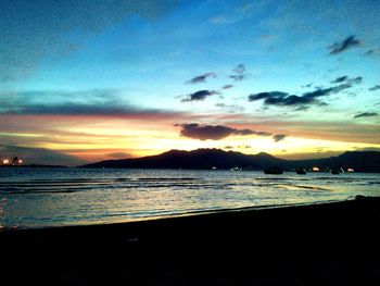 Scenic view of sea against dramatic sky