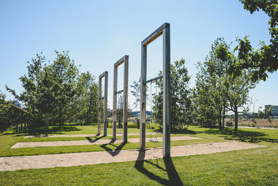 Trees in park against clear sky