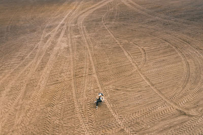 Aerial view of man sitting on chair