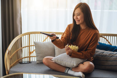 Young woman using mobile phone