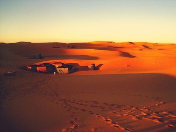 Scenic view of desert against clear sky