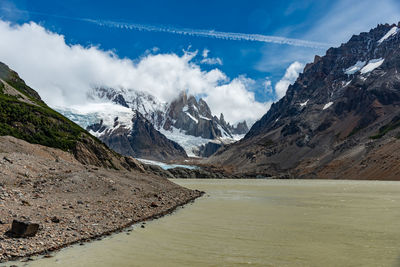 Scenic view of snowcapped mountains against sky