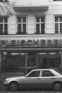 Cars parked in front of building