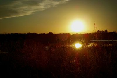 Scenic view of sunset over mountains