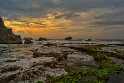 Scenic view of sea against sky during sunset