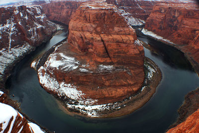 High angle view of rock formation by river