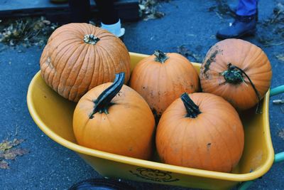 High angle view of pumpkins in cart