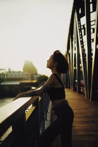 Woman sunset portrait sunlight bridge happy lifetime 