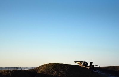 Scenic view of landscape against clear blue sky