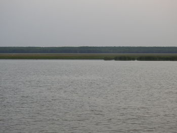 Scenic view of lake against clear sky