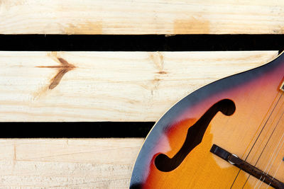 Close-up of mandolin on wooden table