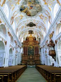 Pew and altar in church