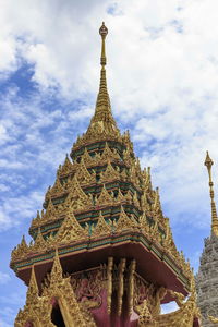 Low angle view of temple against building