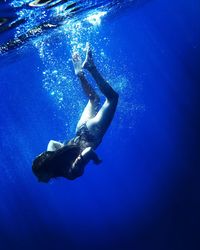 Man swimming in sea