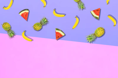 High angle view of fruits over white background