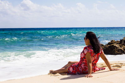 Woman relaxing at beach