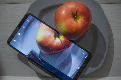 High angle view of apple on table