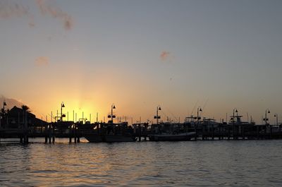 View of harbor at sunset