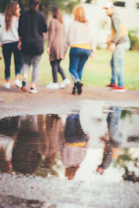 People walking on street in city