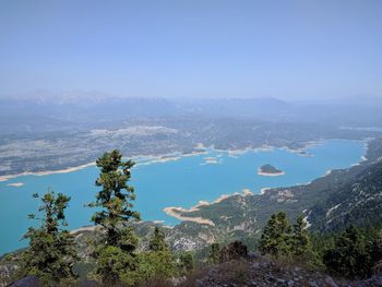 High angle view of mountains against clear blue sky