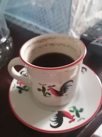 High angle view of coffee cup on table