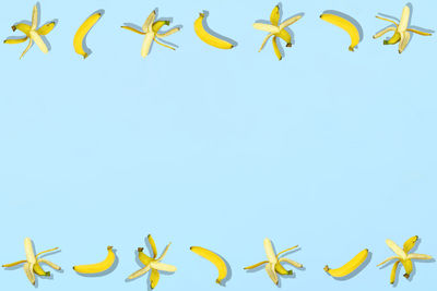 Directly above shot of bananas on blue background