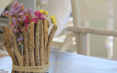 Close-up of flower vase on table