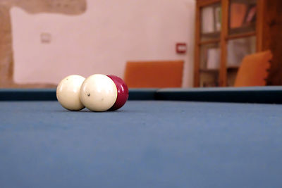 Close-up of pool balls on table