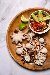 High angle view of mushrooms in bowl on table