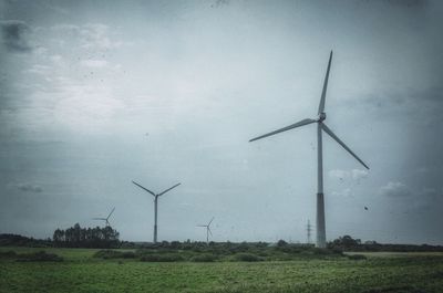 Wind turbines on field