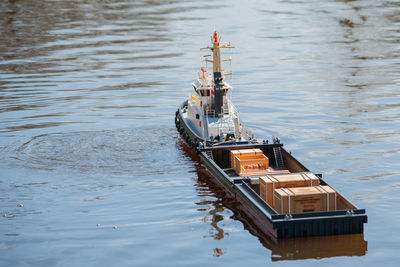 Remote controlled ship model is remote controlled on a lake