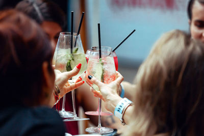 Group of people in drinking glass