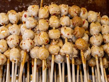 High angle view of onions on barbecue