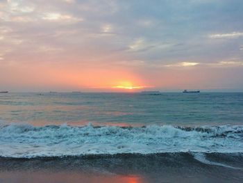 Scenic view of sea against sky during sunset