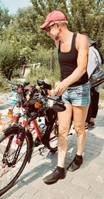 Midsection of woman riding bicycle