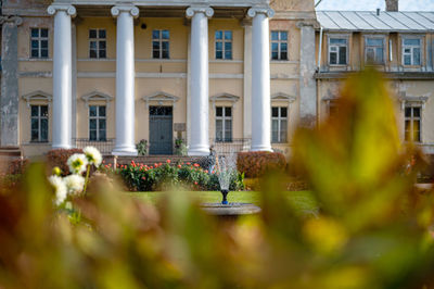 Krimulda manor or castle and garden with a fountain in the gauja national park near sigulda, latvia