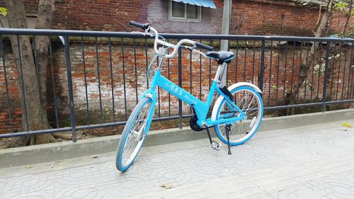 Bicycle against brick wall